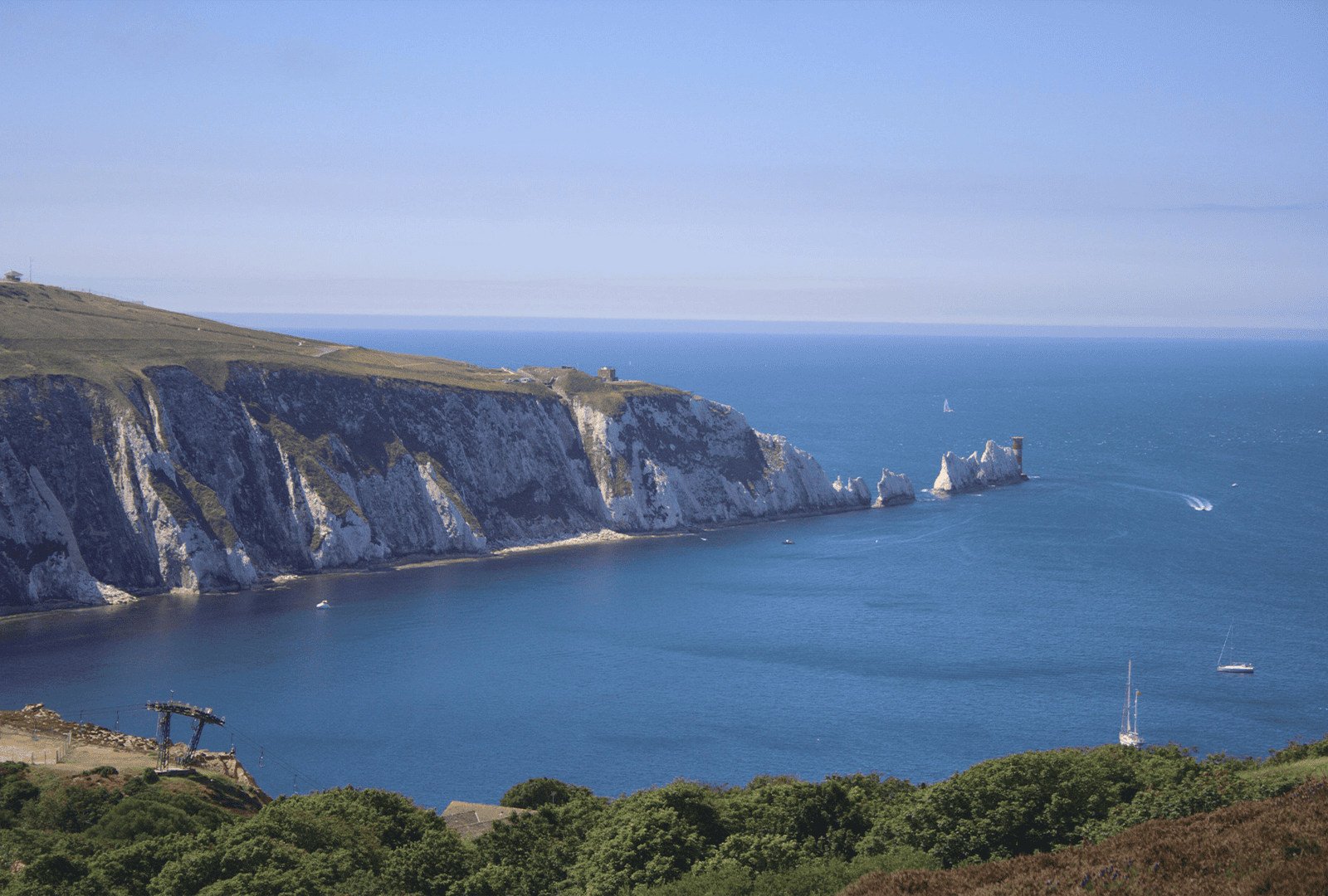 Isle of white needles which are big white rocks that point out of the sea. The picure is a sunny day so rare